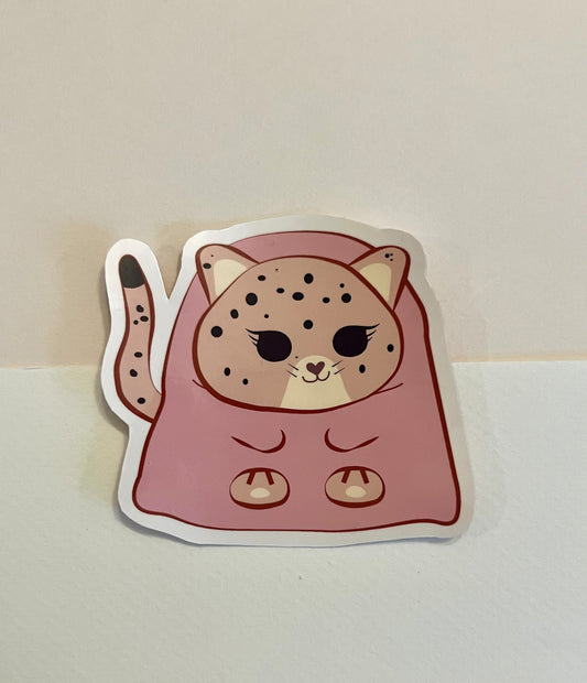 Sticker of a cat in a pink outfit. Cozy Pink Jaguar vinyl sticker for journaling.