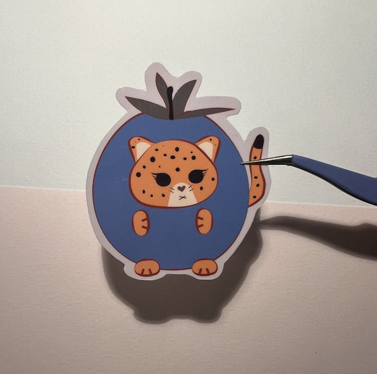 Funny and cute jaguar die-cut sticker with bluenerry outfit 'on a white background
